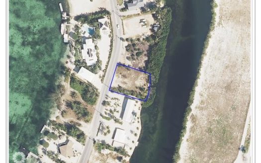 CAYMAN KAI CANAL FRONT LOT W/ APPROVED PLANS – WATER CAY ROAD