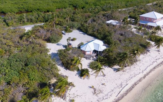 LITTLE CAYMAN LAND WITH BEACHFRONT COTTAGE